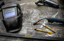 U-Mark A20 paint marker in use on a fabrication bench